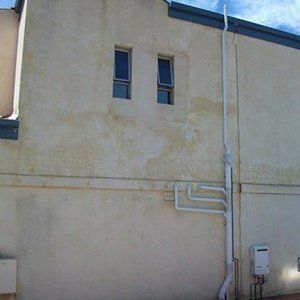 exterior of building with two windows