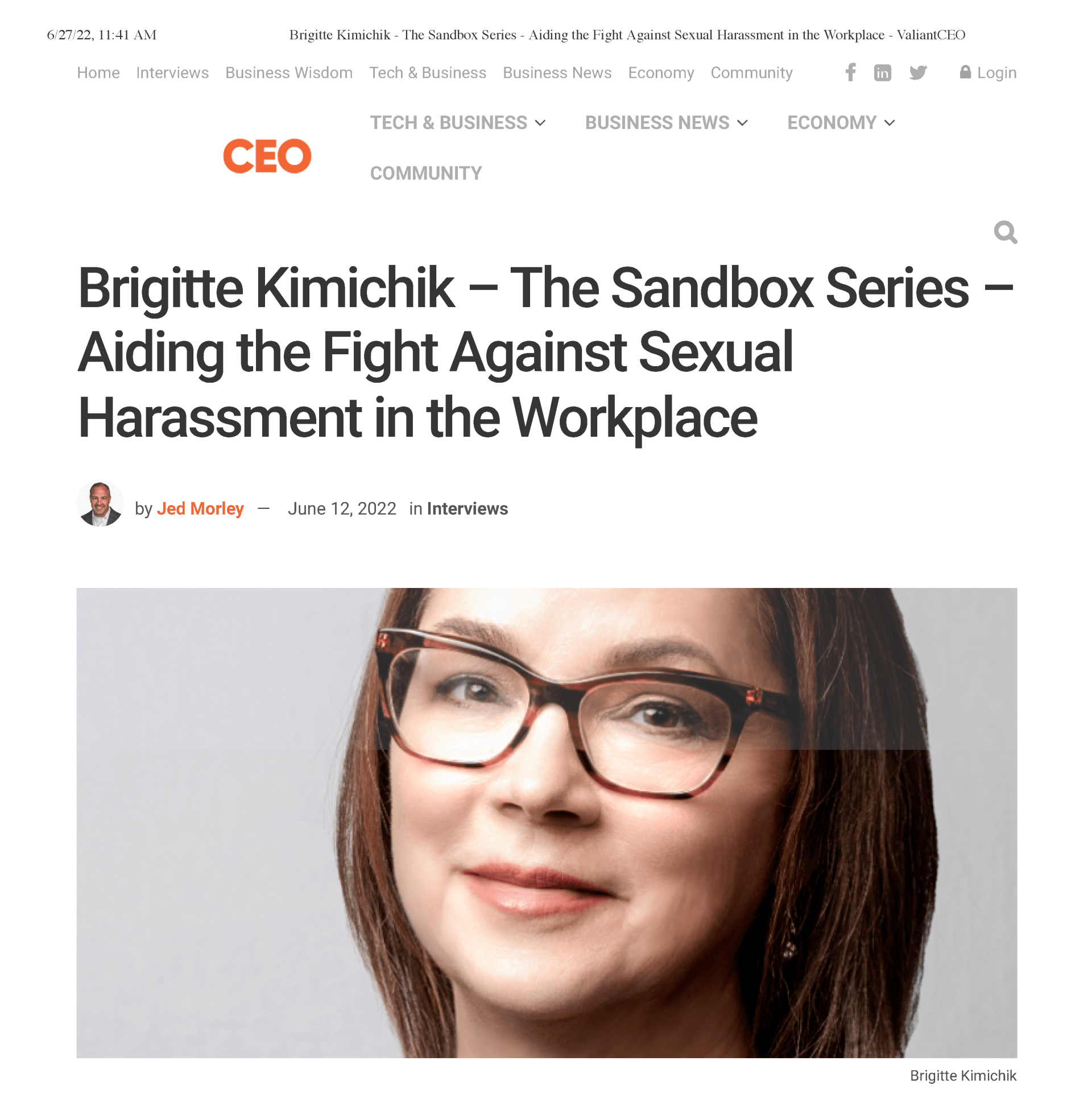 A woman wearing glasses is featured on a website.