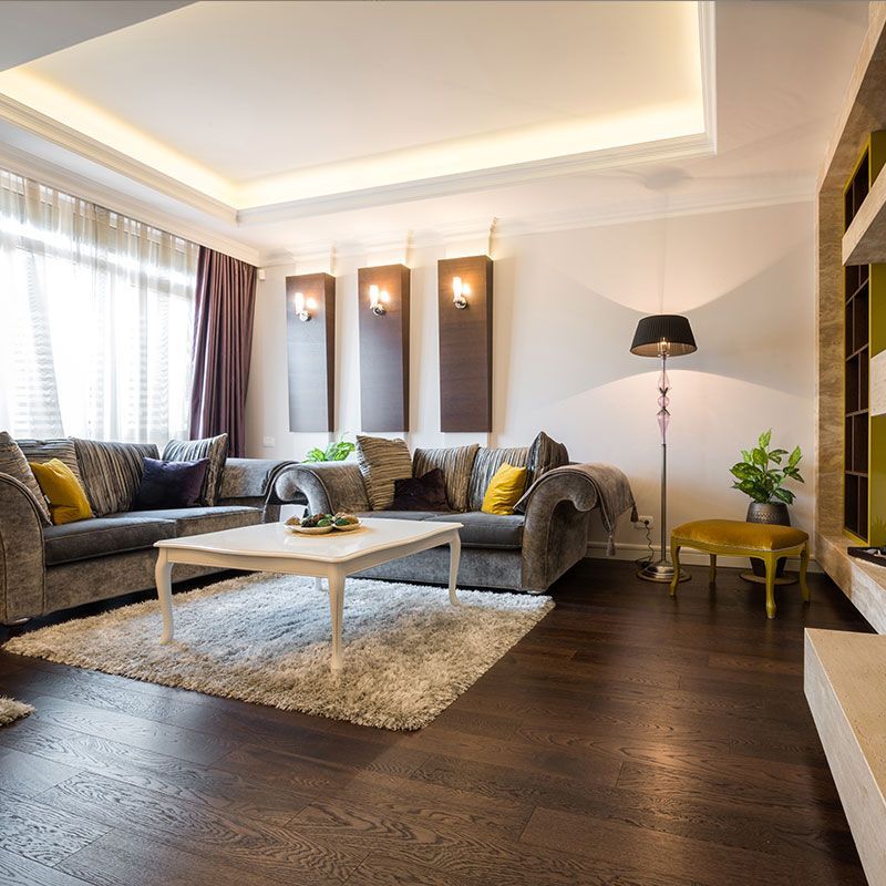 A living room with a couch and a coffee table