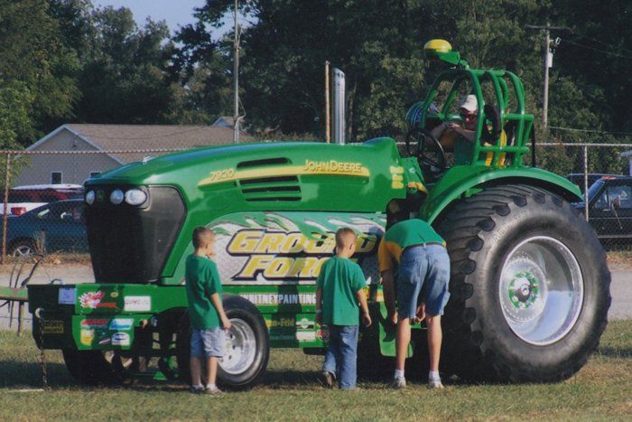 Green John Deere tractor with 
