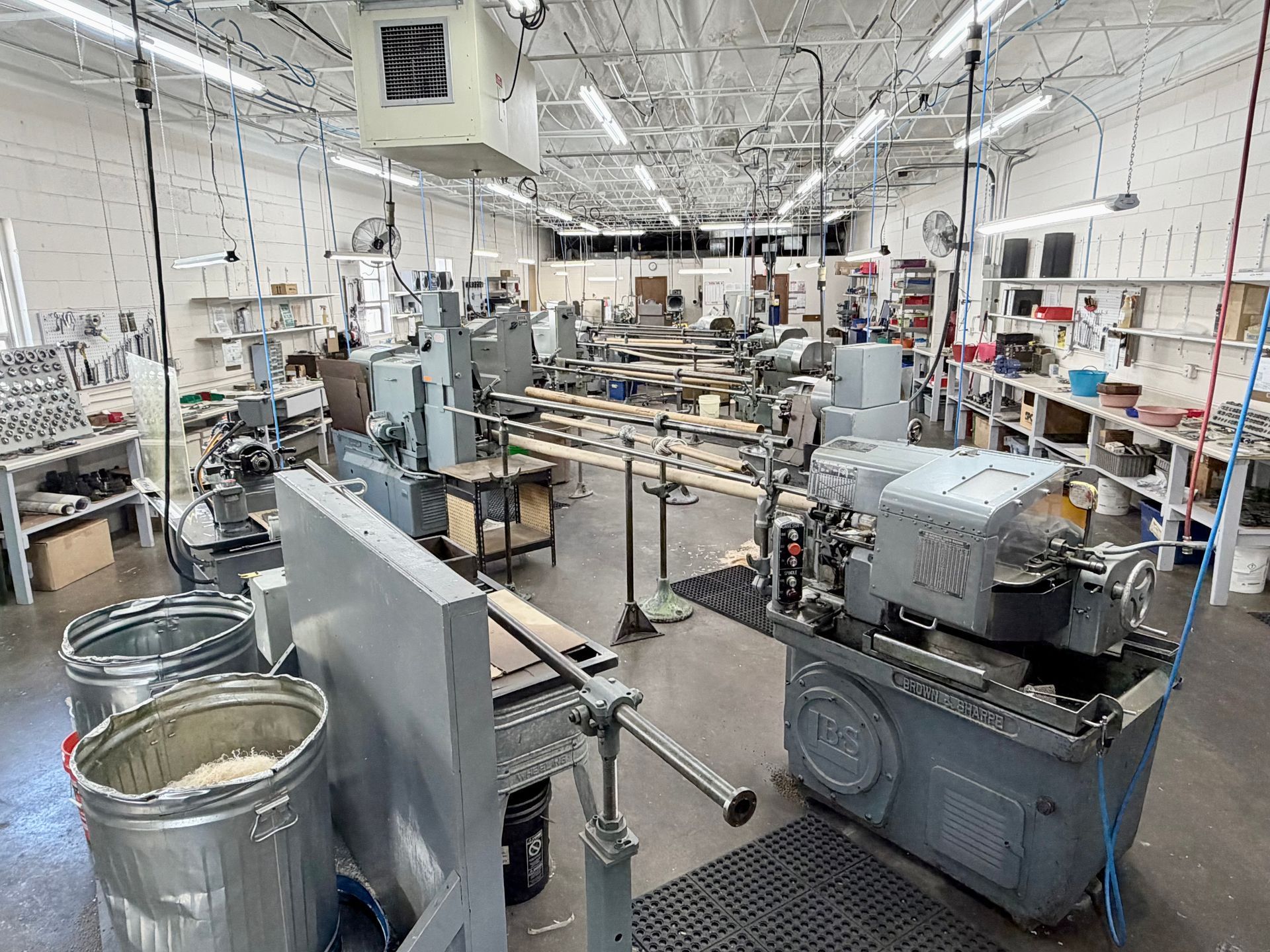 CNC milling machine cutting metal, spraying coolant.