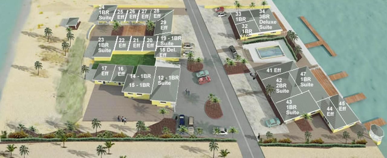 An aerial view of a beach with a lot of buildings