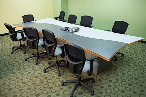 Vinyl Plank — Slide Projector And A Conference Phone On The Table in Staten Island, NY