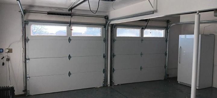 A picture of a garage door before and after being repaired.