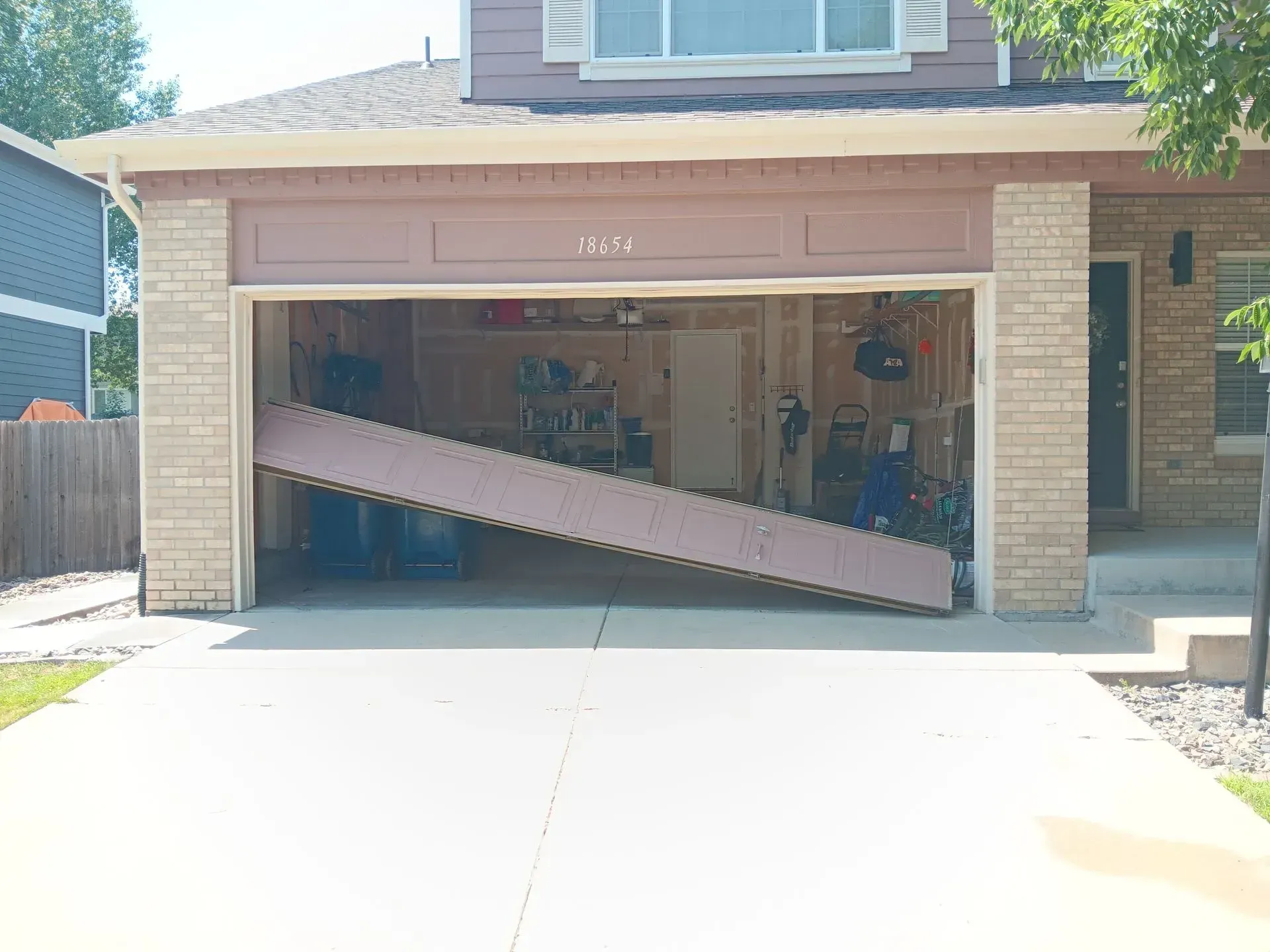 A garage door with a ramp coming out of it.