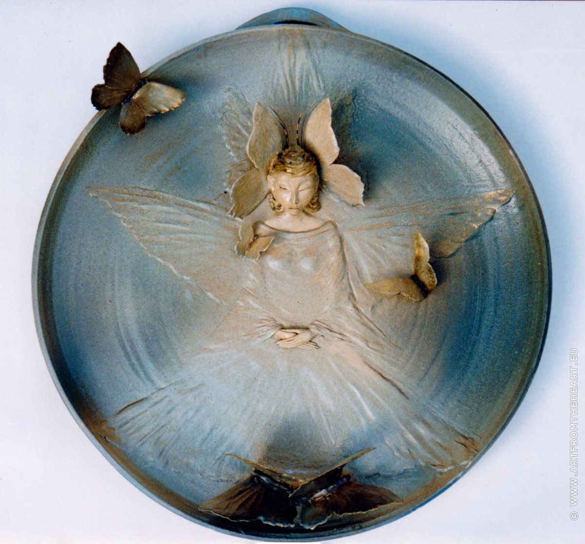 Vlinder-licht, keramiek wandbord