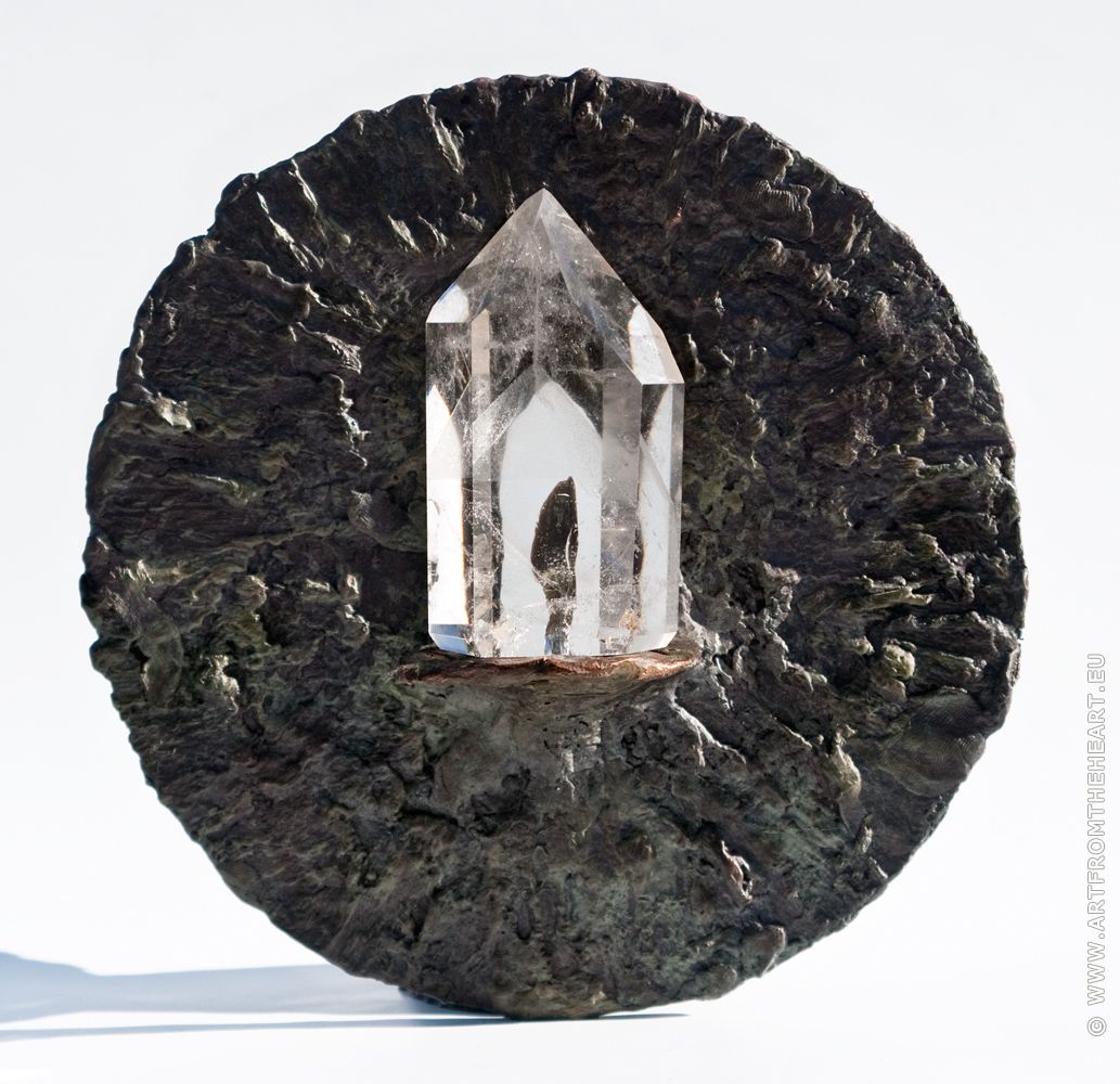 Bronzen lichtje met bergkristal