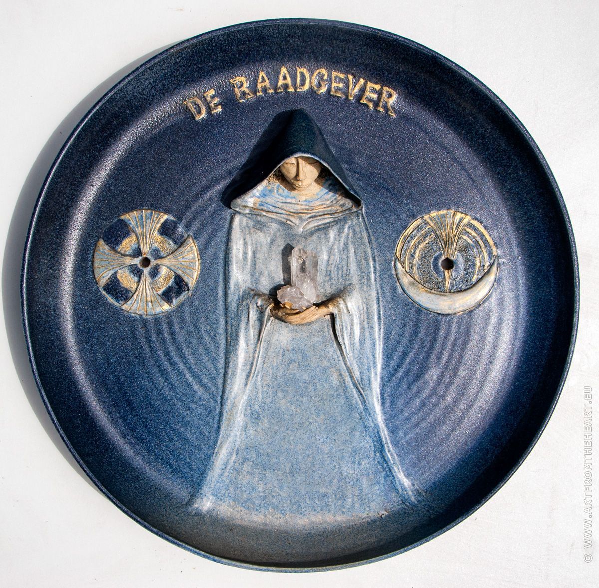 De Raadgever, keramiek wandbord