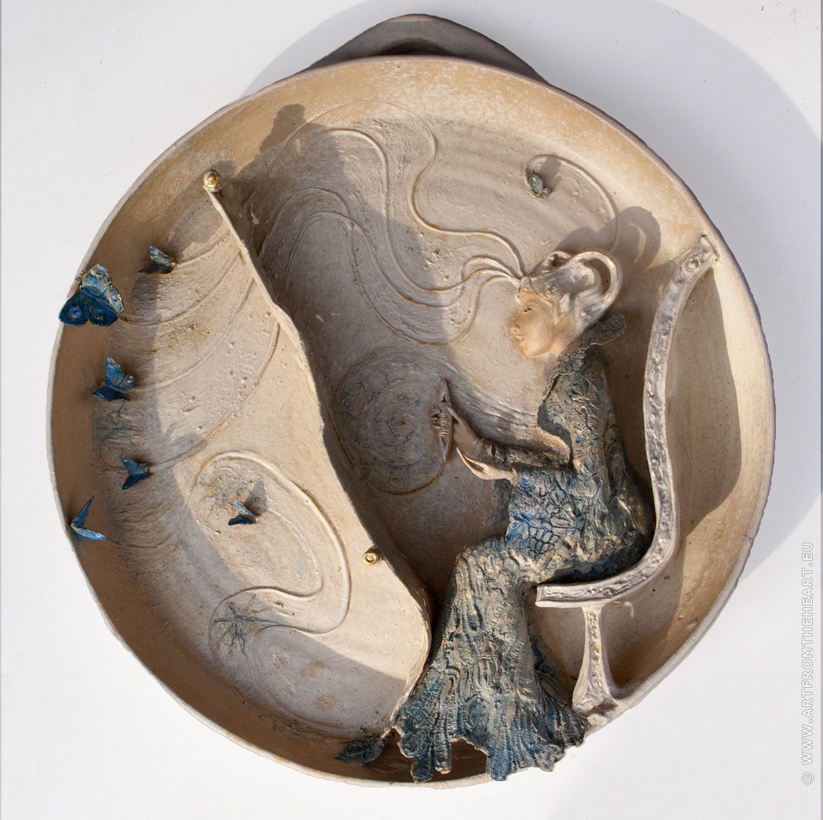 De weefster, keramiek wandbord