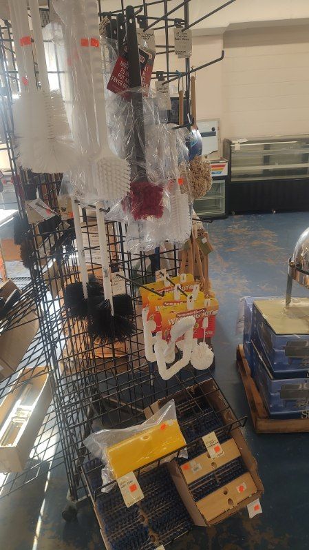 A store filled with lots of items hanging on racks.