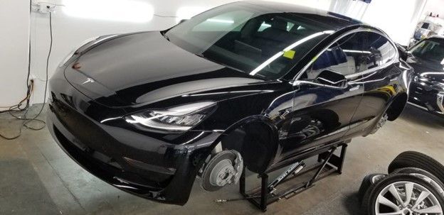 Black Shiny Car — Fresno, CA — Precision Window Tinting