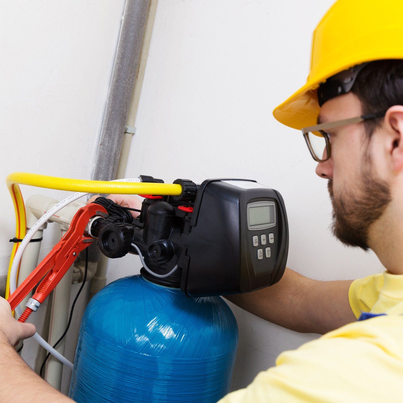 Installing Water Filtration System — Orlando, FL — Florida Pure Water Services Installing Water Filtration System — Orlando, FL — Florida Pure Water Services