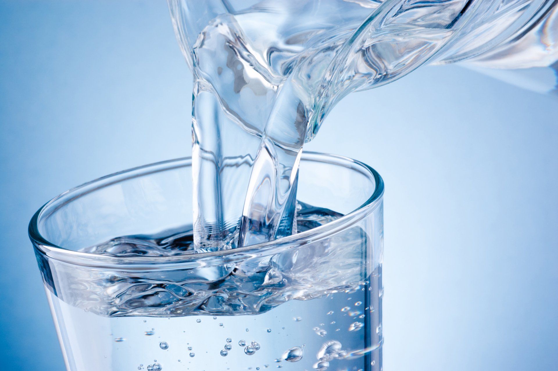 Pouring Water to a Glass — Orlando, FL — Florida Pure Water Services