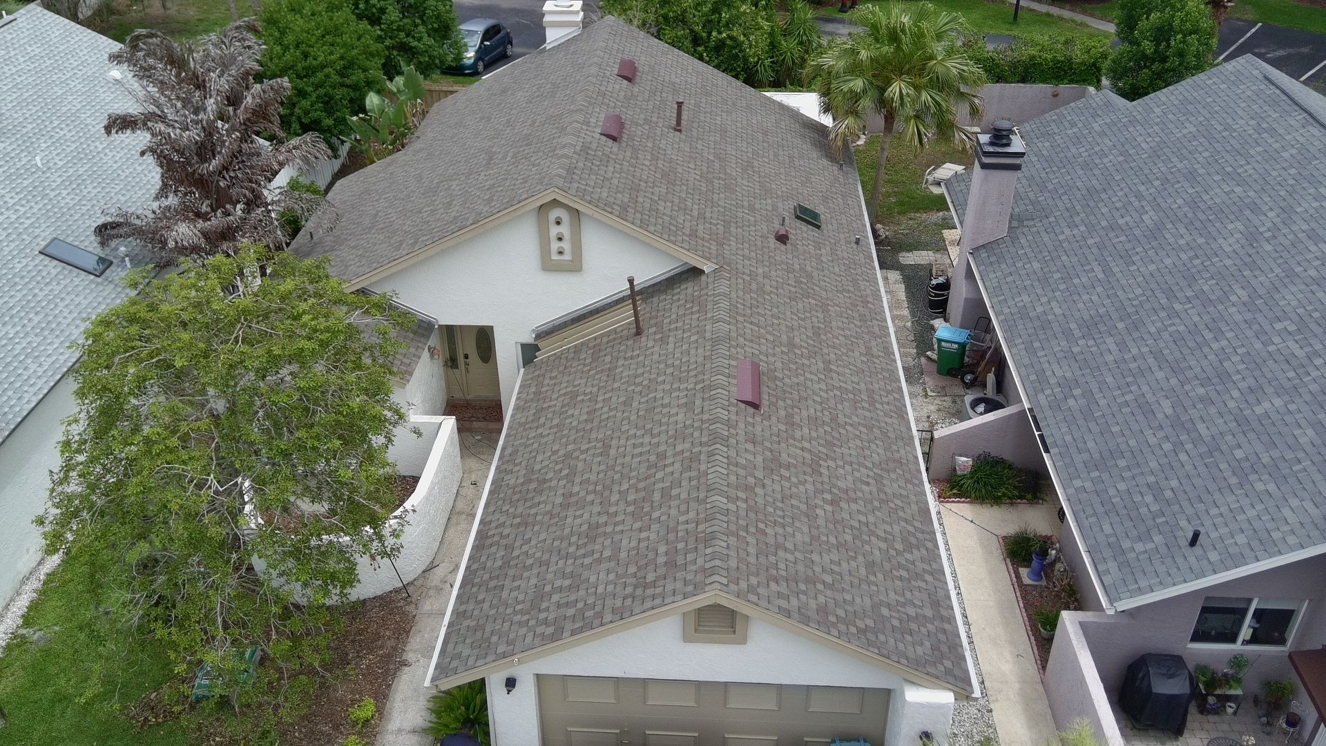 Aerial roof inspection view of an Orlando area property