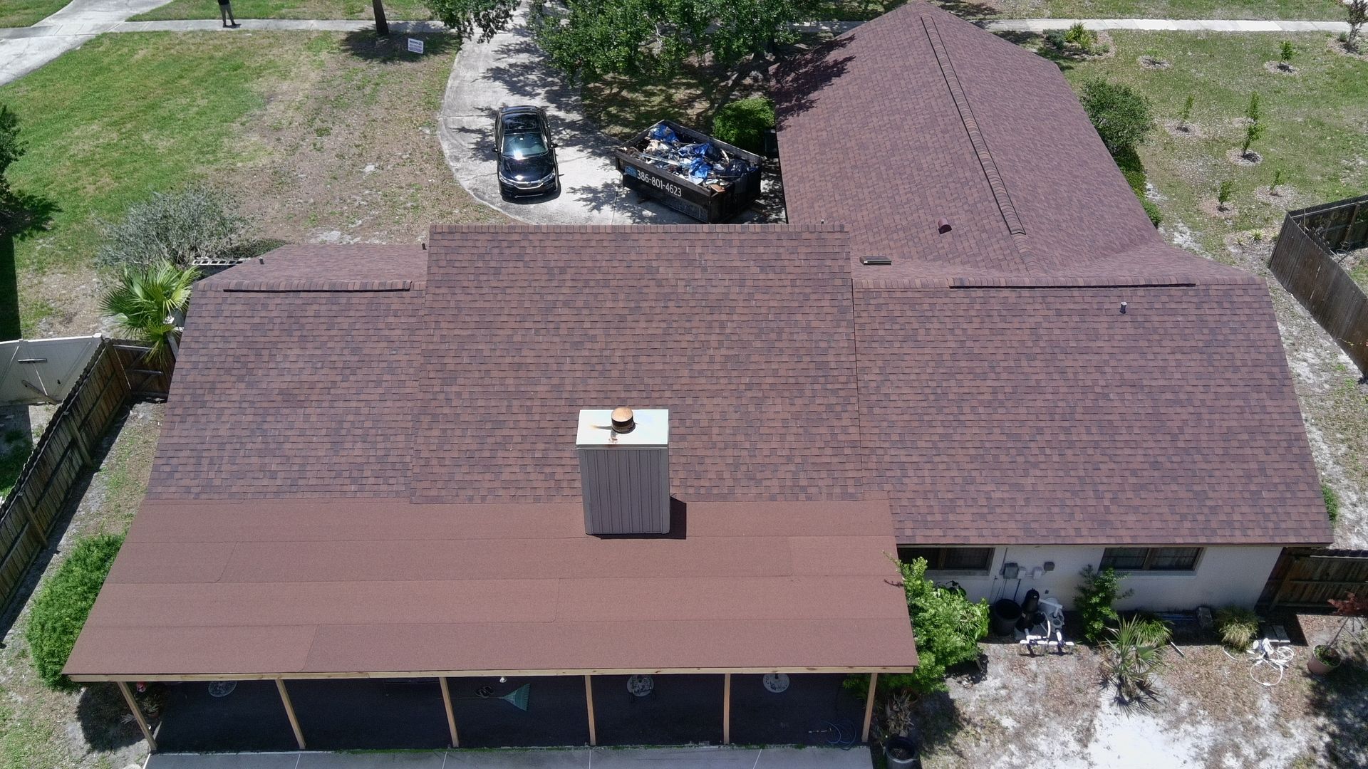 Revildor roofing contractor completing a residential roofing project in Orlando, Florida