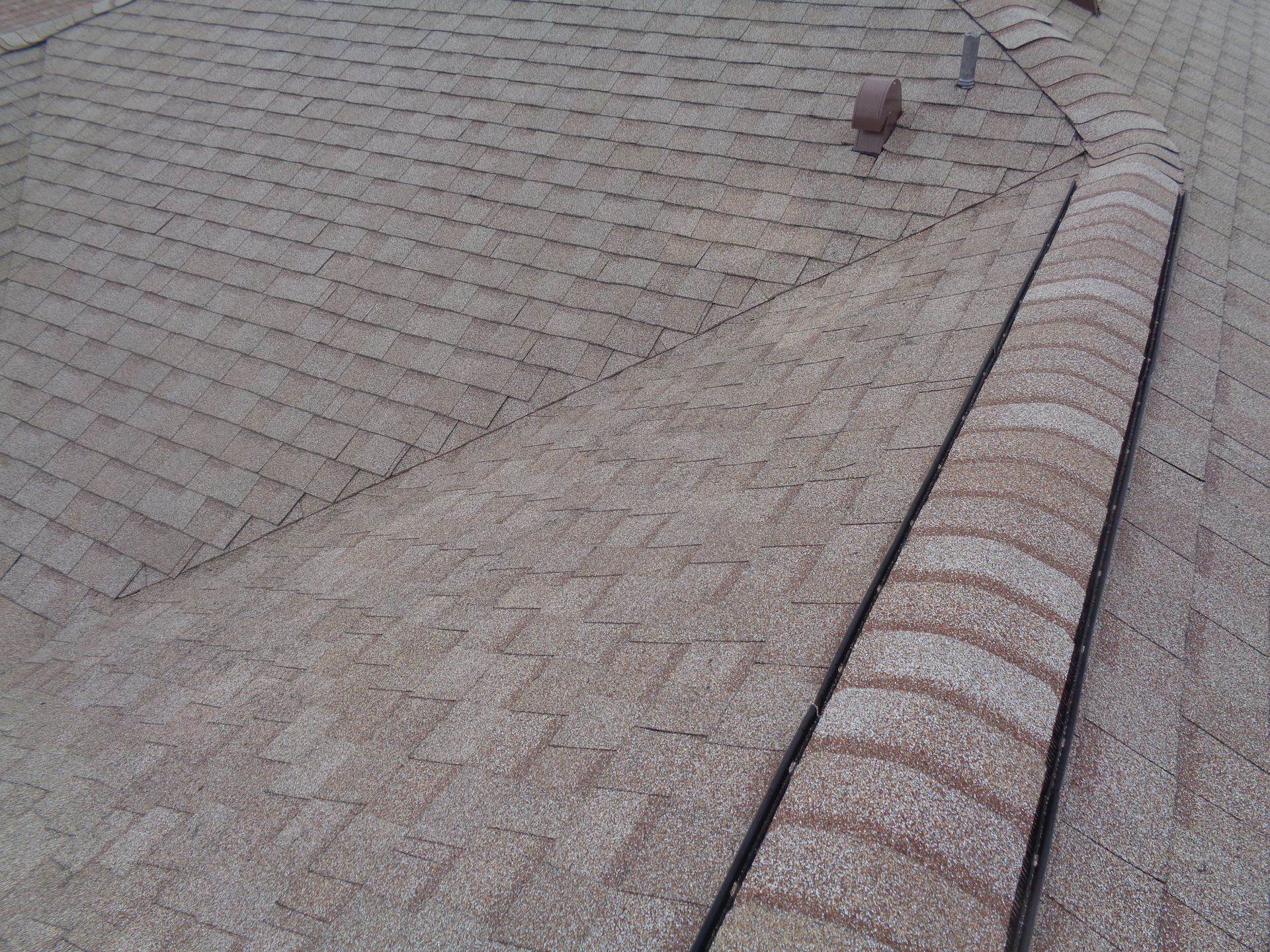 Completed asphalt shingle roof reviewed by Revildor in Orlando Florida