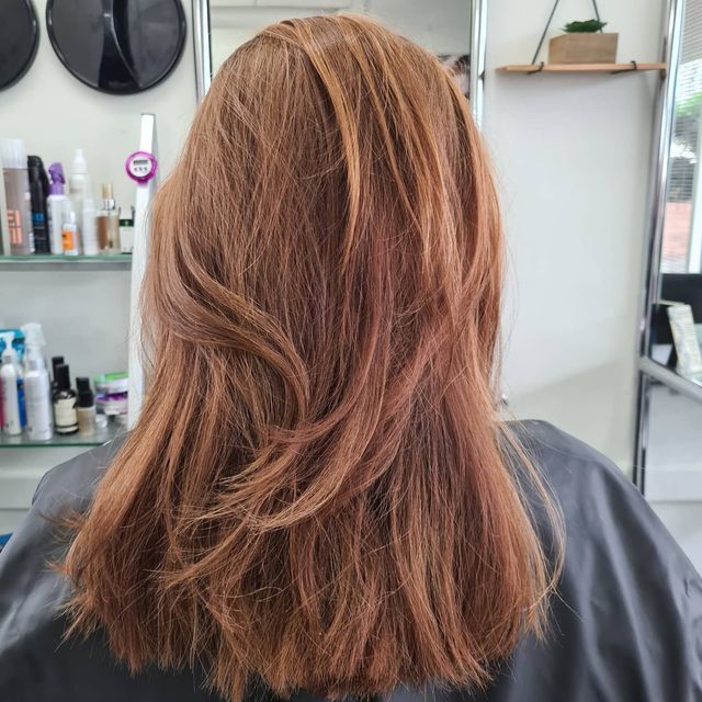 The Back of a Woman's Hair is Shown in a Salon — Lush Hair Studio in Tumbi Umbi, NSW
