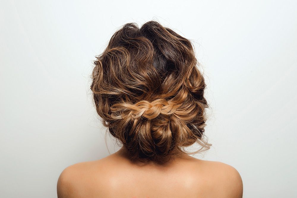 The Back of a Woman With Her Hair in a Bun — Lush Hair Studio in Tumbi Umbi, NSW