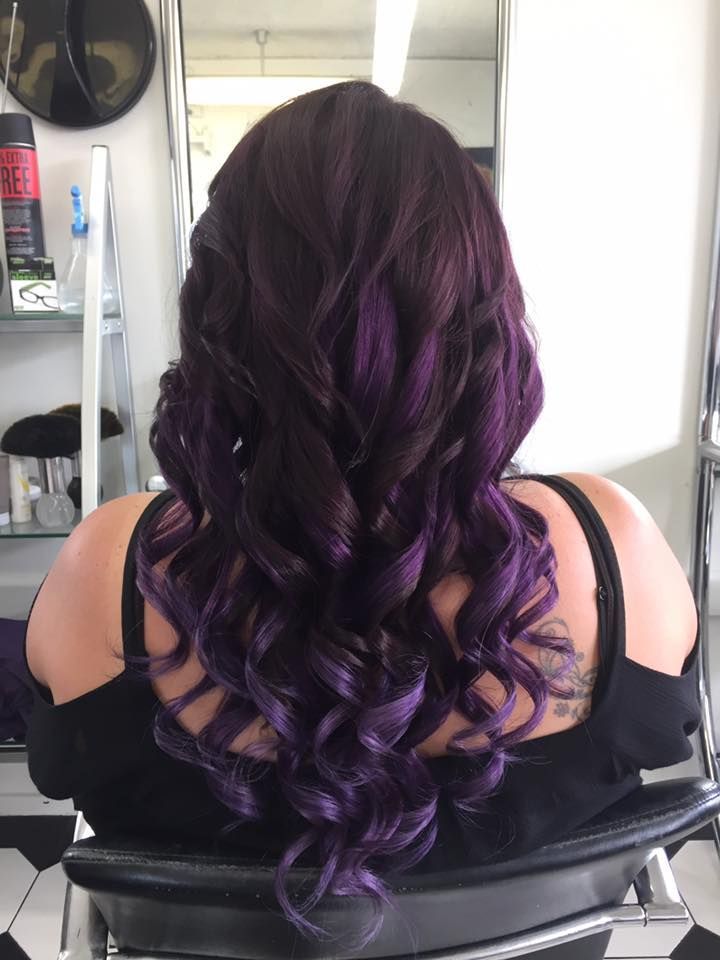 A Woman With Purple Hair is Sitting in a Chair — Lush Hair Studio in Tumbi Umbi, NSW