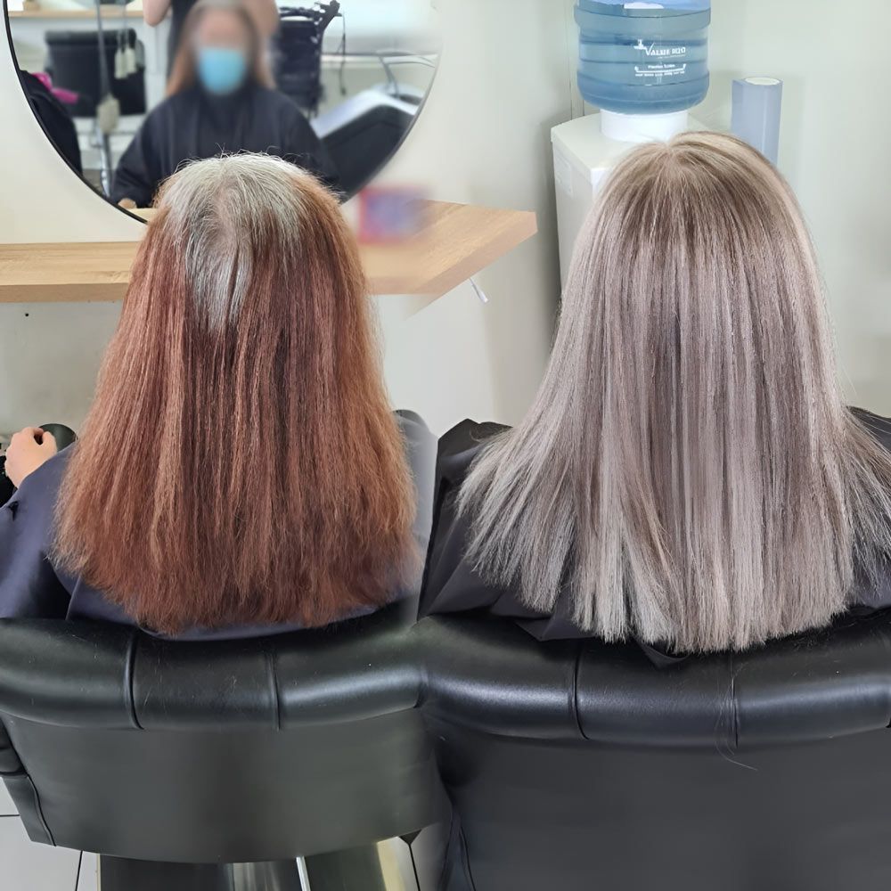 Two Women With Long Hair Are Sitting in Chairs in Front of a Mirror — Lush Hair Studio in Tumbi Umbi, NSW