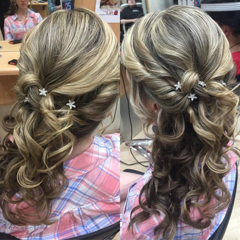 A Woman is Sitting in a Chair With Her Hair in a Half Up Half Down Hairstyle — Lush Hair Studio in Tumbi Umbi, NSW