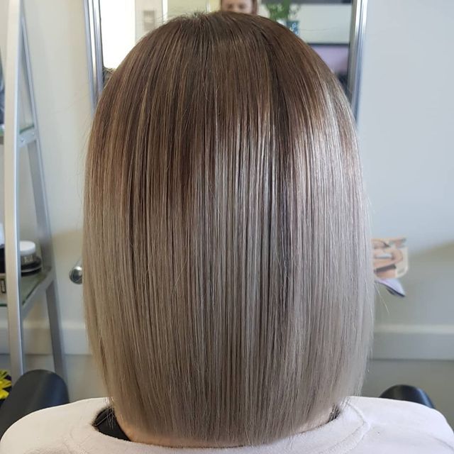 The Back of a Woman's Hair is Shown in a Salon — Lush Hair Studio in Tumbi Umbi, NSW
