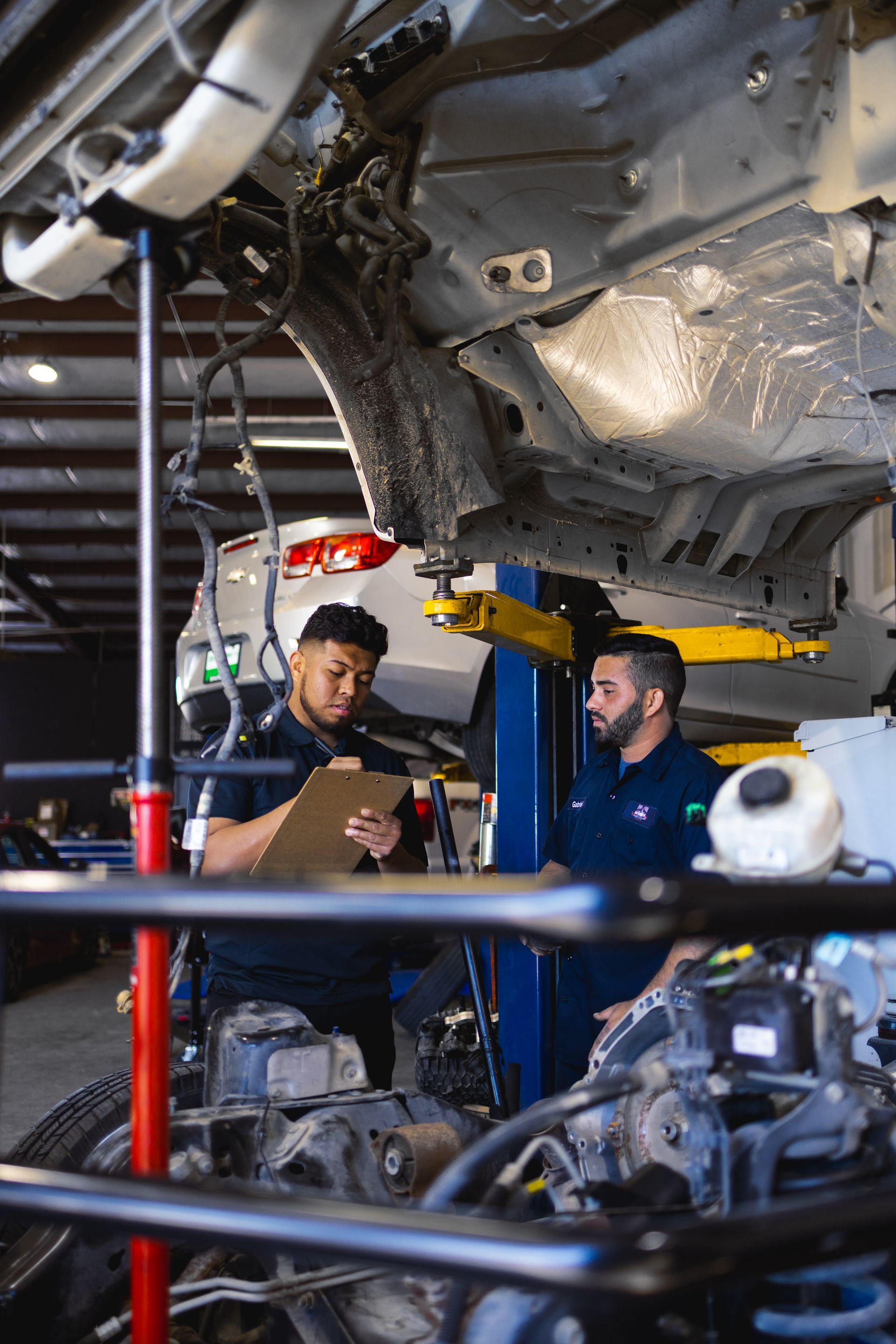 Mechanics Discussing Repairs | Five Star Automotive and Collision