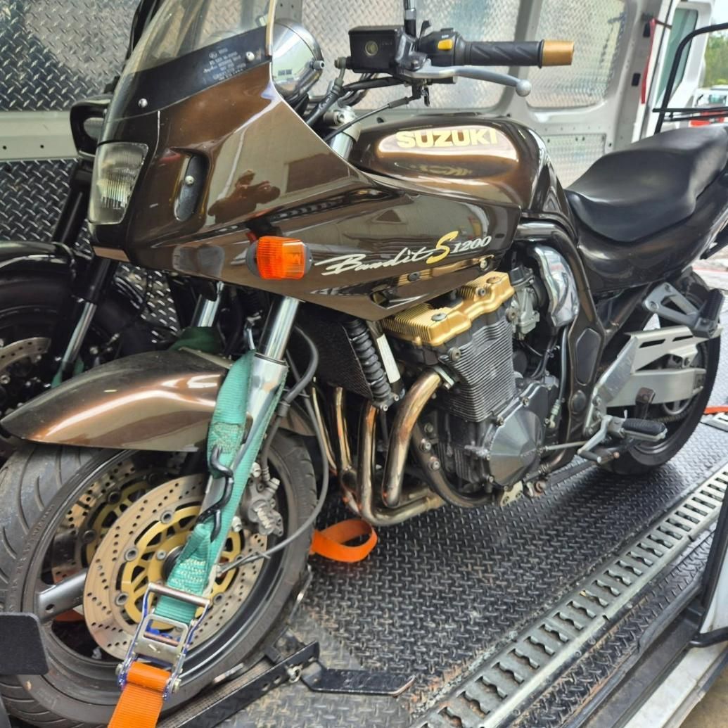 A Motorcycle Is Sitting On Top Of A Trailer — Motow Motorcycle Transport In Sandgate, NSW