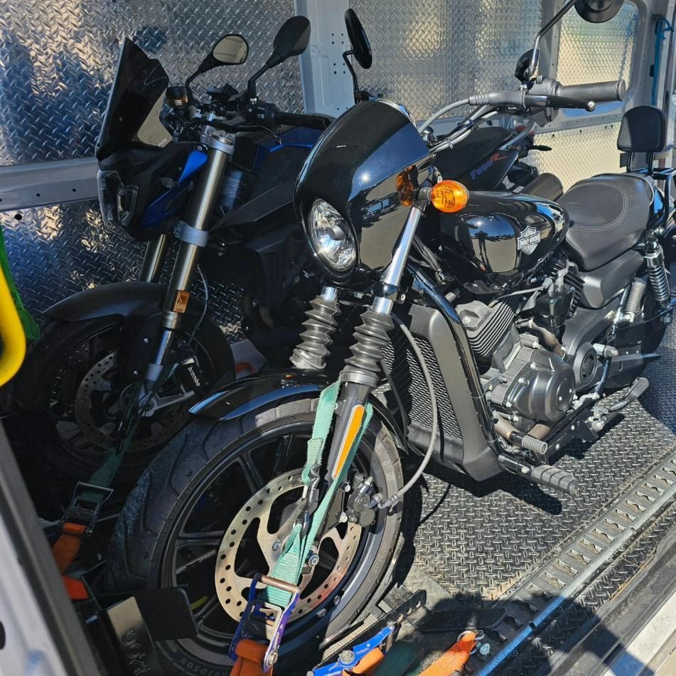 Two Motorcycles Are Tied Together In The Back Of A Van — Motow Motorcycle Transport In Sandgate, NSW
