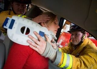 Woman Getting Helped With A Fireman — Personal, Injury In Youngstown, OH
