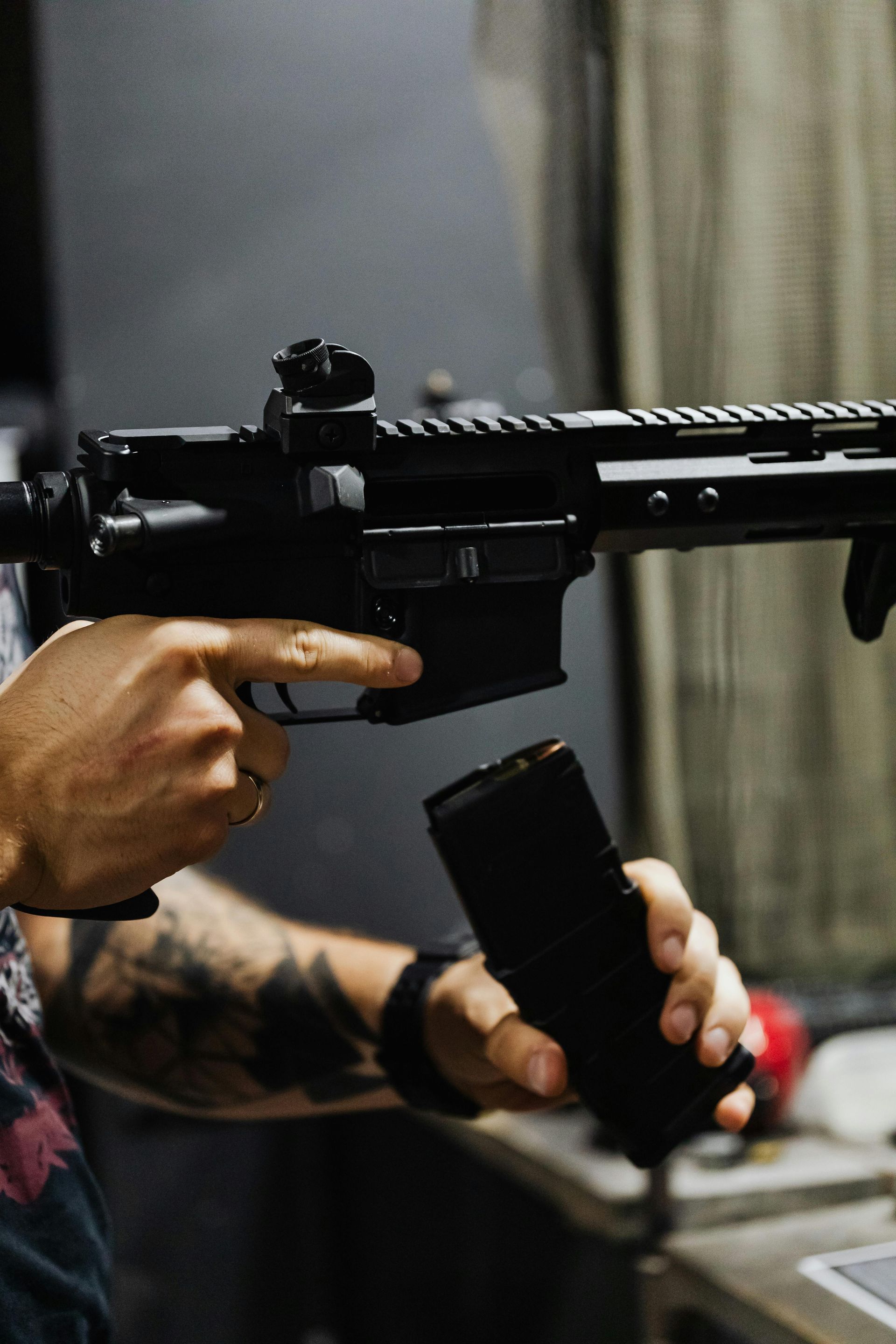 A man reloads an AR-15