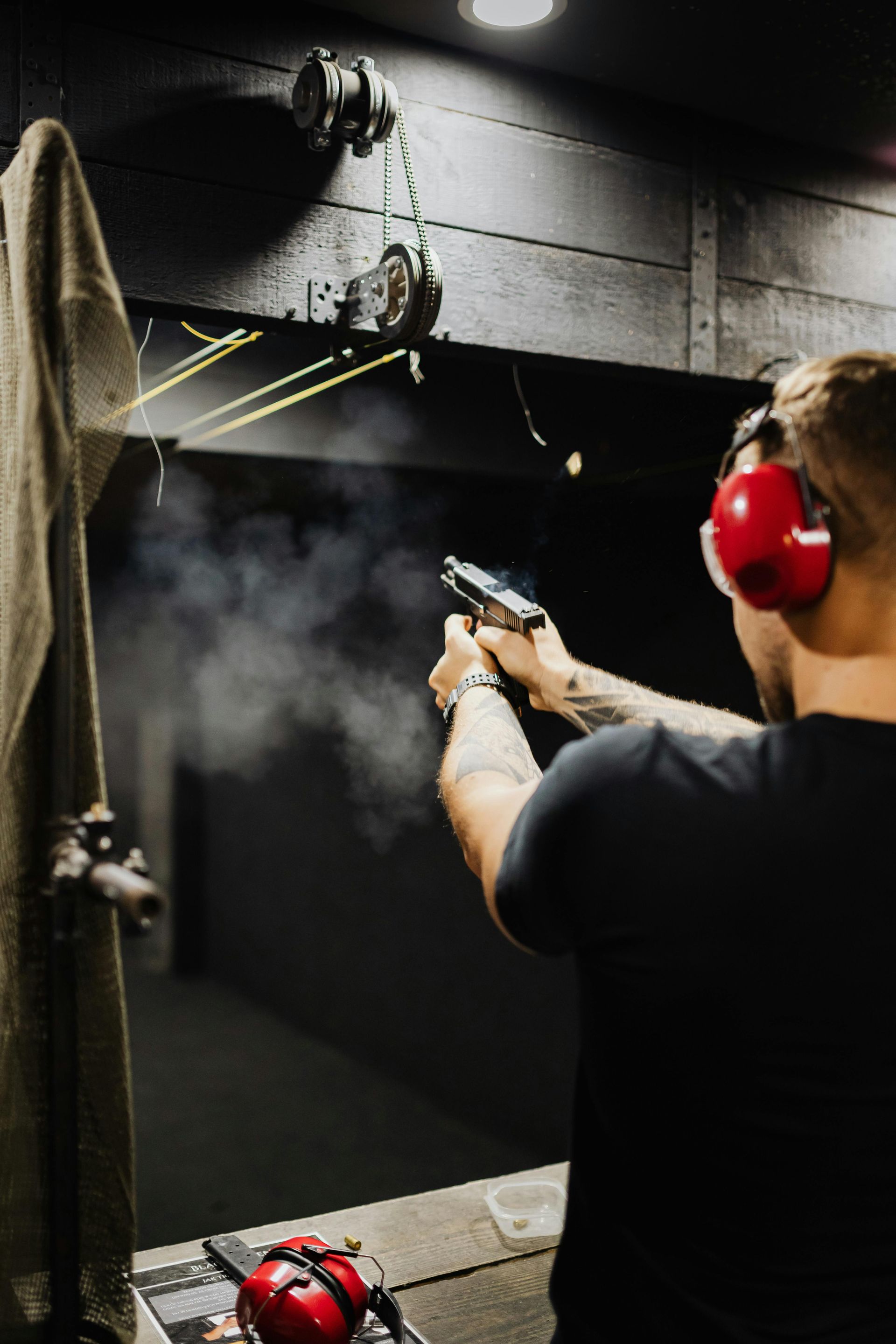 A man prpares to reload a handgun