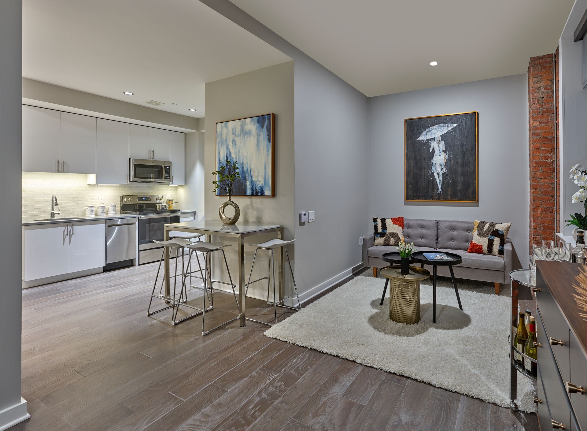 A living room with a couch and a table in it