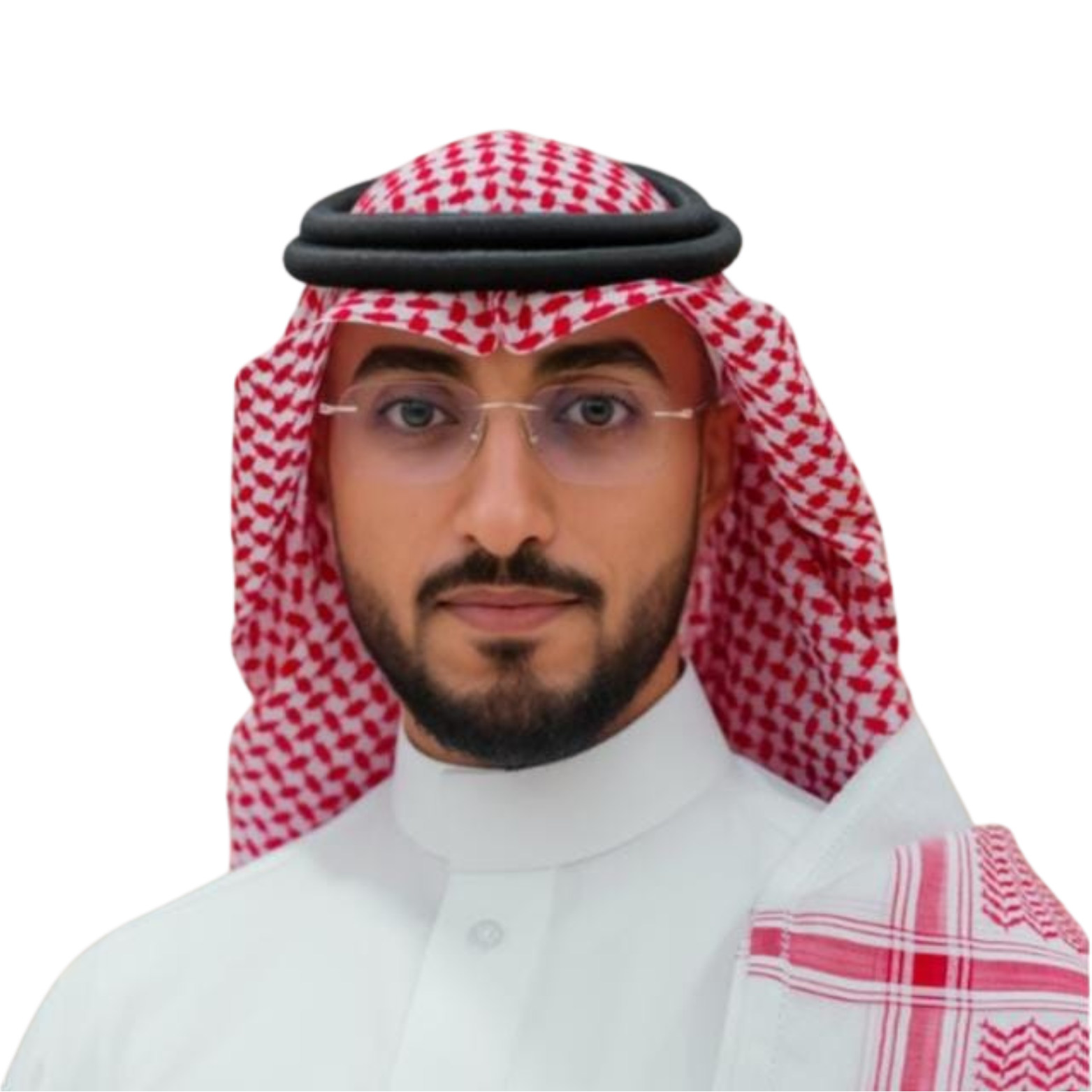 Man in traditional Saudi attire wearing glasses, looking at the camera.