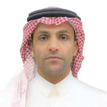 Man wearing traditional Arab headdress (ghutra and agal) and white thobe, looking forward.