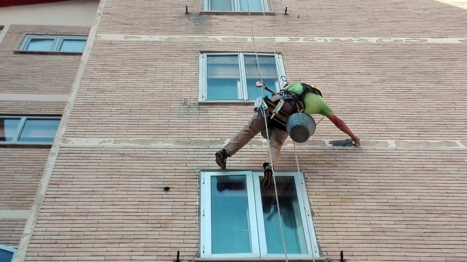 pulizia finestre in quota