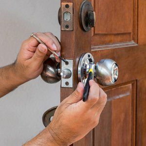 Man Fixing Door Knob - Clovis, CA - A1 Lock and Key Services