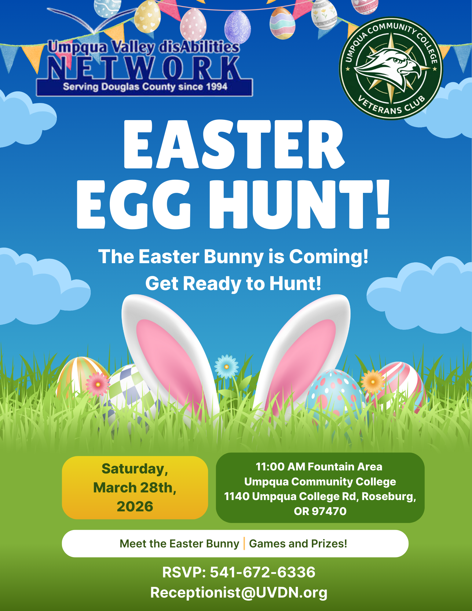 Two young girls are sitting at a table in the woods.