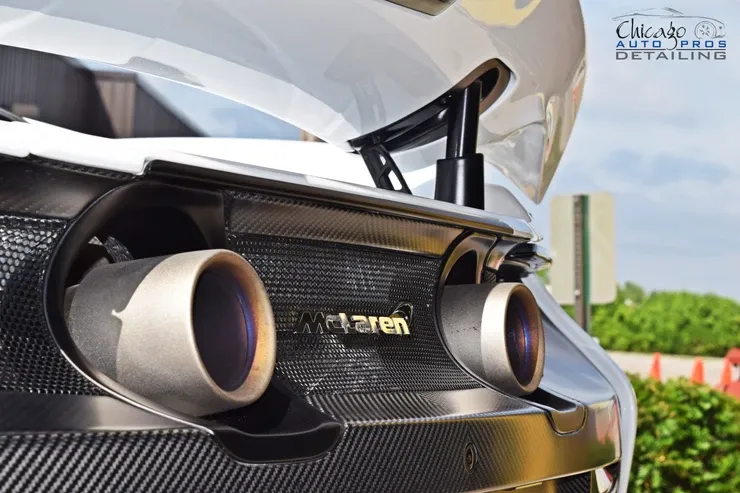A close up of the rear end of a mclaren car