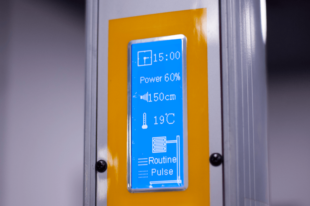 A close up of a blue and yellow sign that says routine pulse