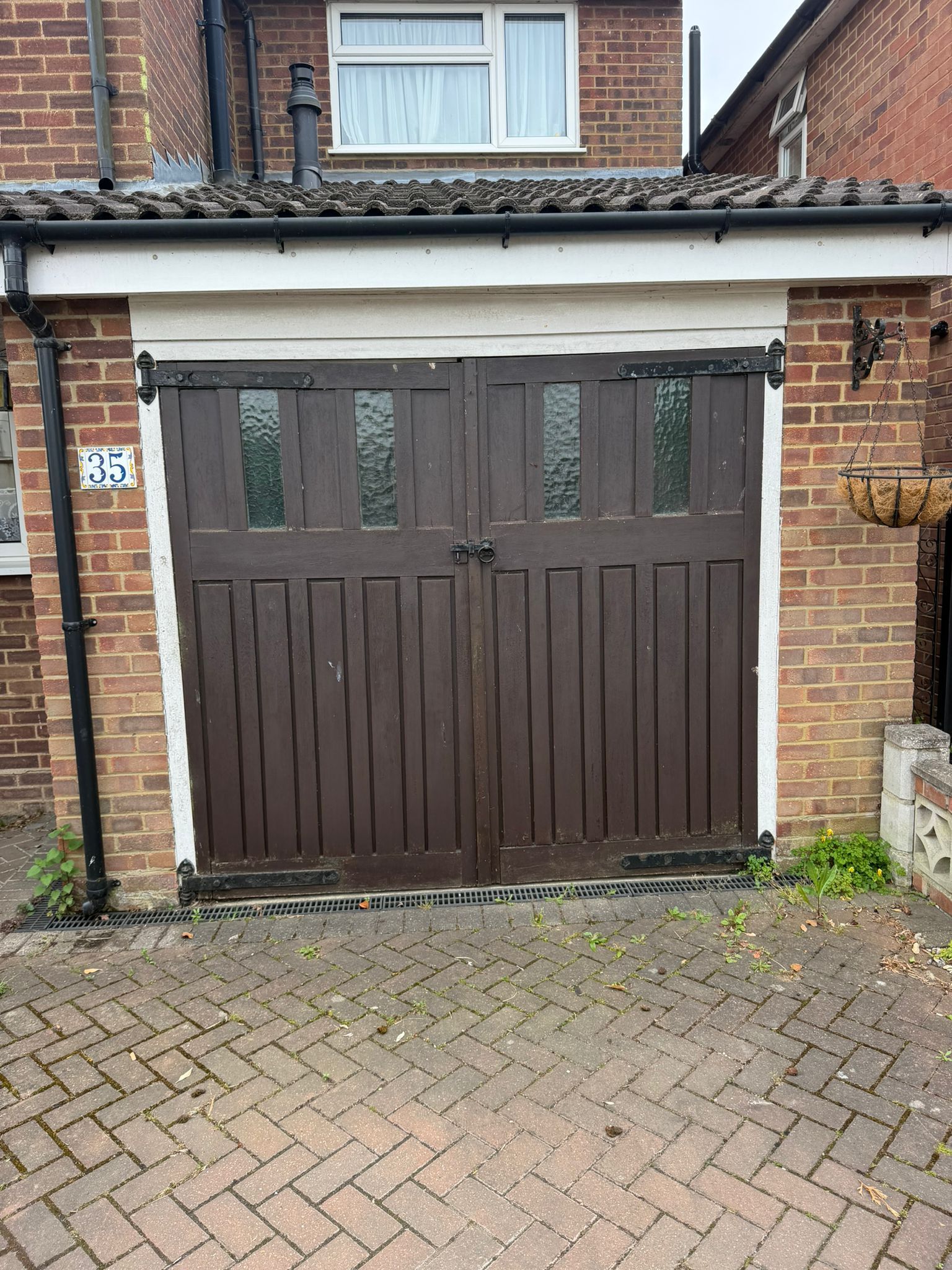 Old Timber garage doors removed in Ware by Manor garage doors to fit a new roller door 