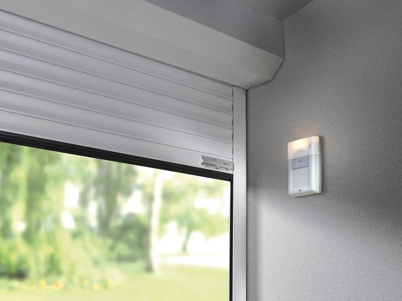 internal view of roller door with somfy wall control box and bottom edge saftey system 