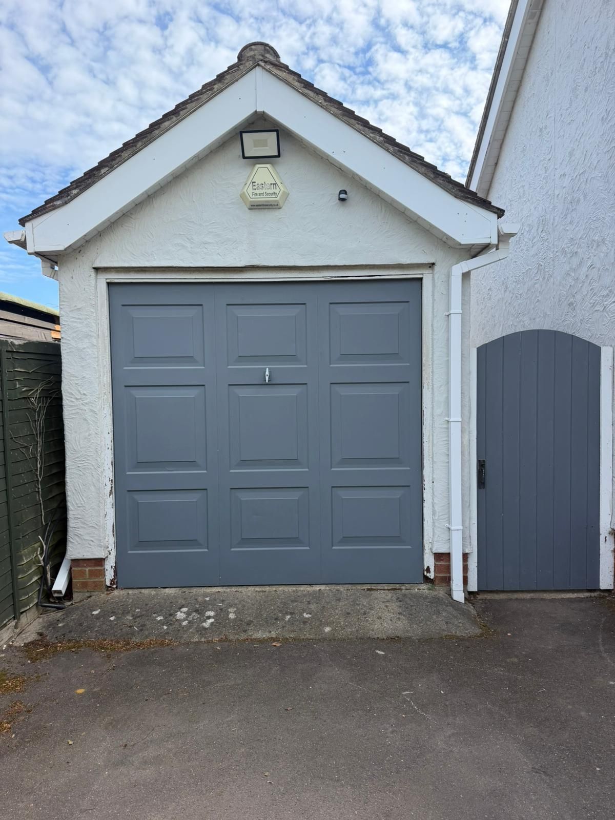 Old and tired up and over garage doors in Bishop stortford 