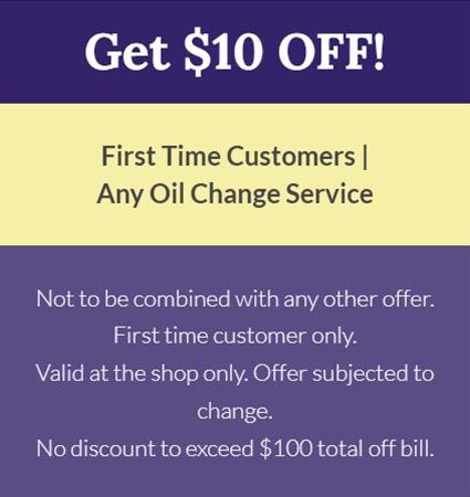 A sign that says get $10 off for first time customers any oil change service