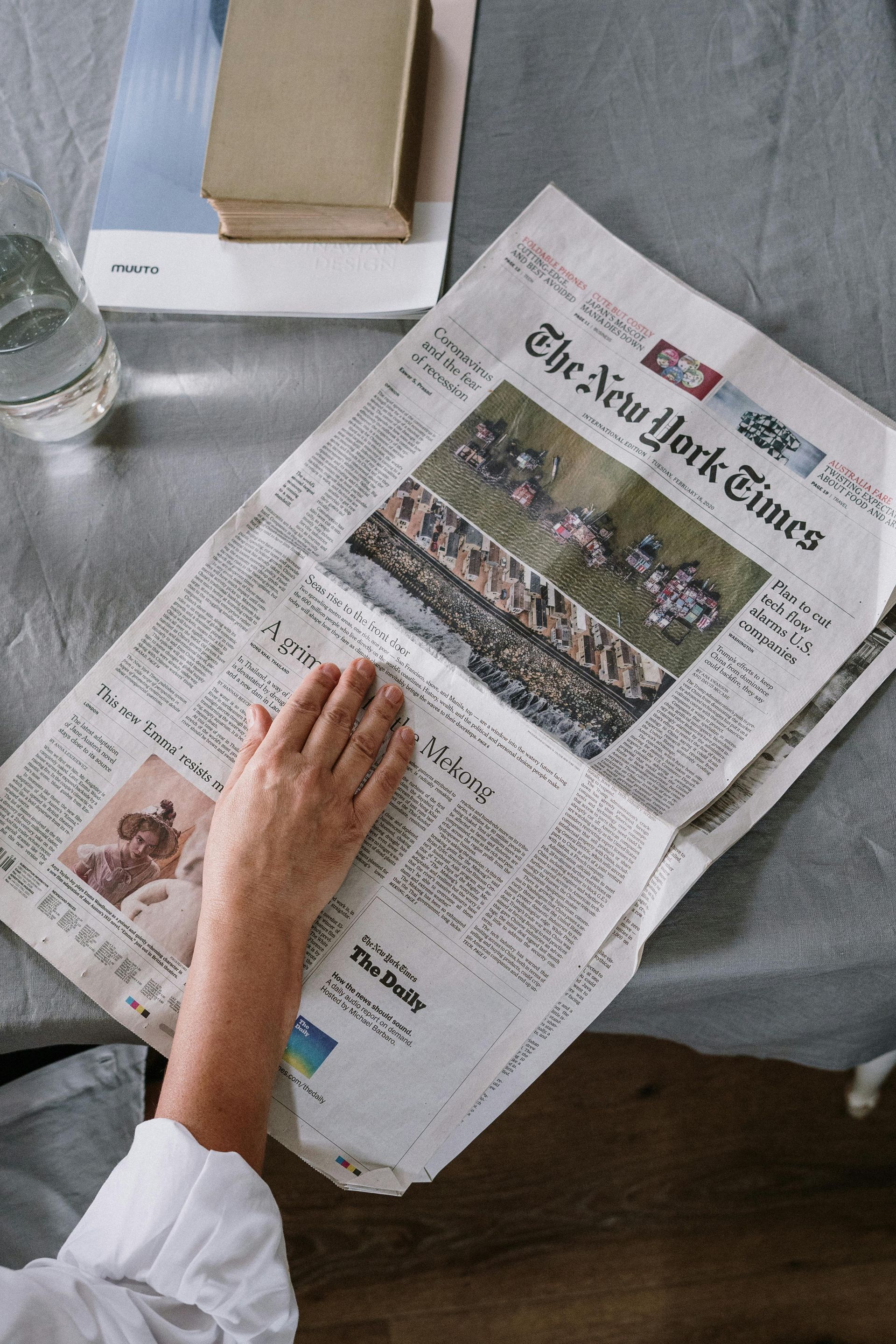 A lady reading a thought leadership article in her favorite publication