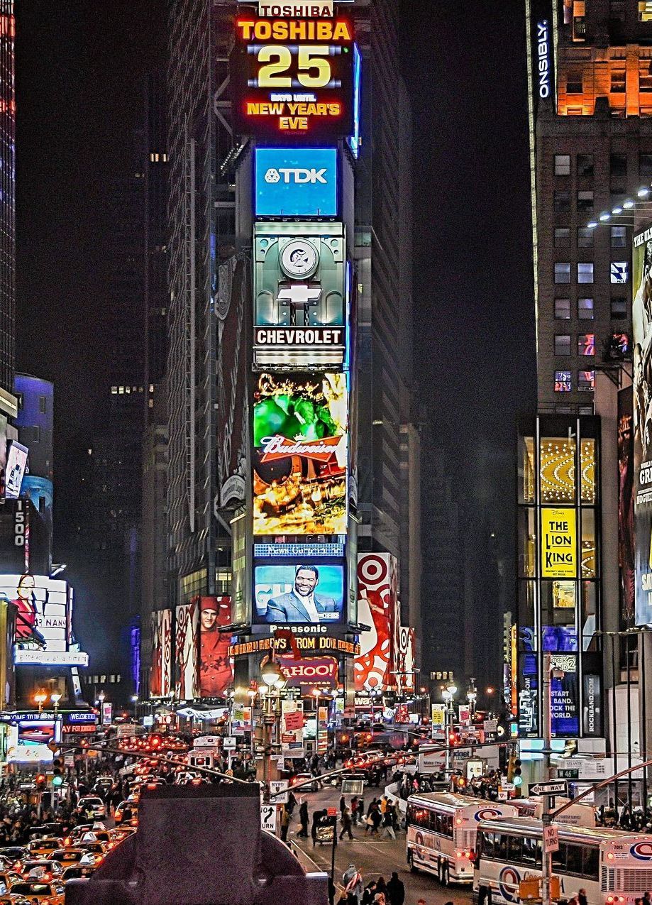 New York Time Square where there are a lot of billboards and advertising so brands need to create engaging content so that they can stand out in a crowded market