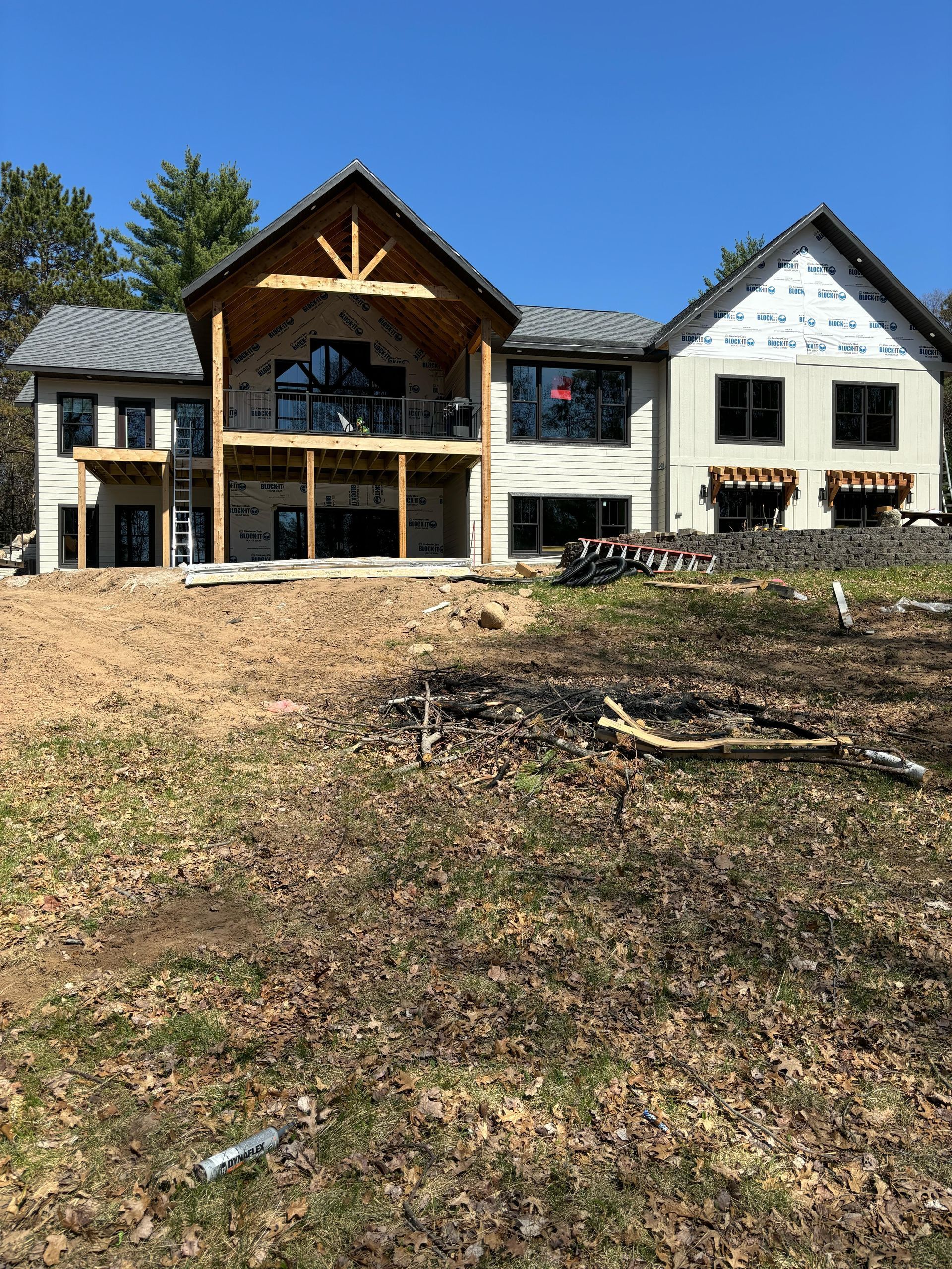 A bathroom with two sinks and two mirrors