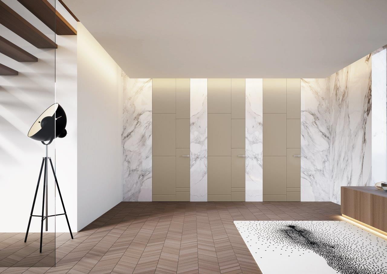 Porte in legno a Pordenone color beige chiaro su muro color marmo