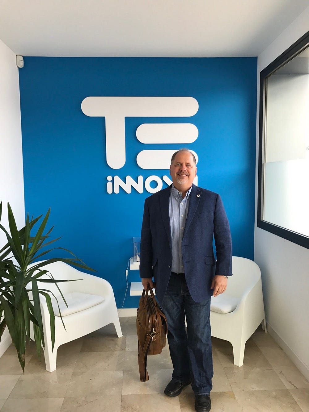 Businessman standing | Elgin, IL | 'I' in Team Series By IA Business Advisors