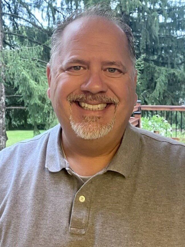 Brian S. Smith with a tree background | Elgin, IL | 'I' in Team Series By IA Business Advisors